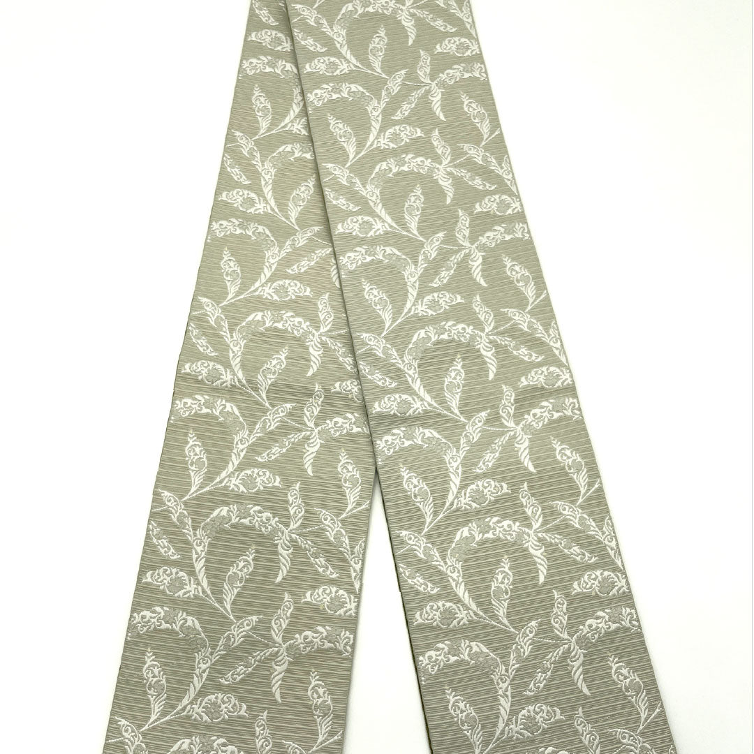 (新品)半幅帯 ポリエステル NEWランク 裏柳色(うらやなぎいろ) 早蕨色(さわらびいろ) 植物模様 花菱風 リバーシブル 帯丈400cm グレー系 1125002651422
