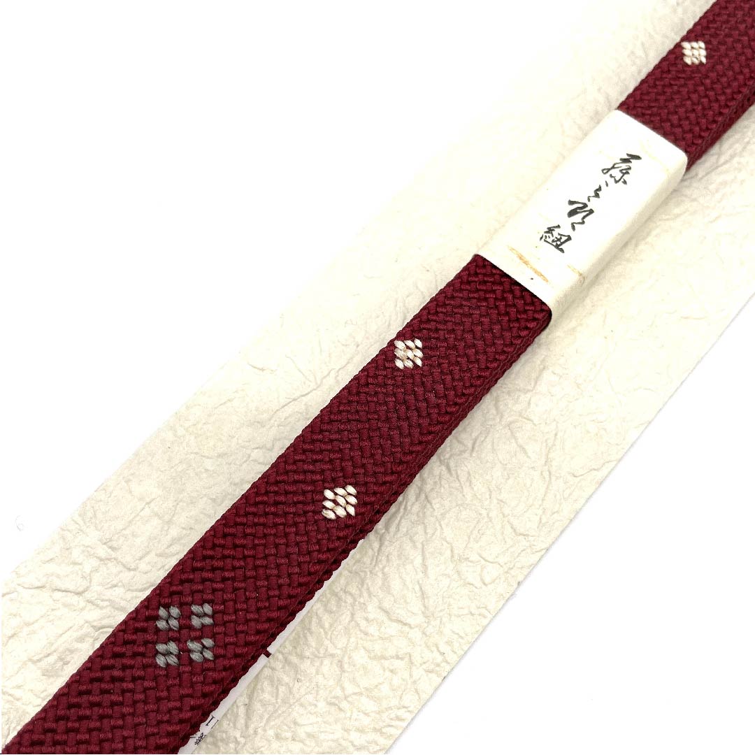 (新古品) 帯締め 正絹 四分紐 海老色(えびいろ) 四代藤三郎紐 小花模様 新古品 長さ約160cm 幅約1.5cm カジュアル Sランク 赤系 1135000102912