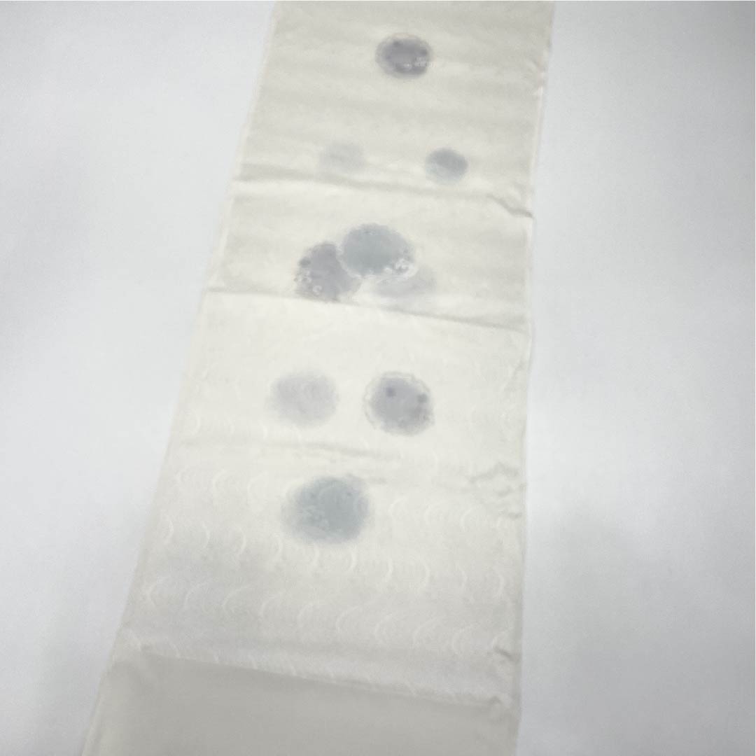 Semi-formal silk obiage (sash sash), grade A, gofun-iro (white powder-colored), with a design of flowing water, snowflakes, and waves. Length: approximately 180cm, width: approximately 30cm, white, part number 1136002273911