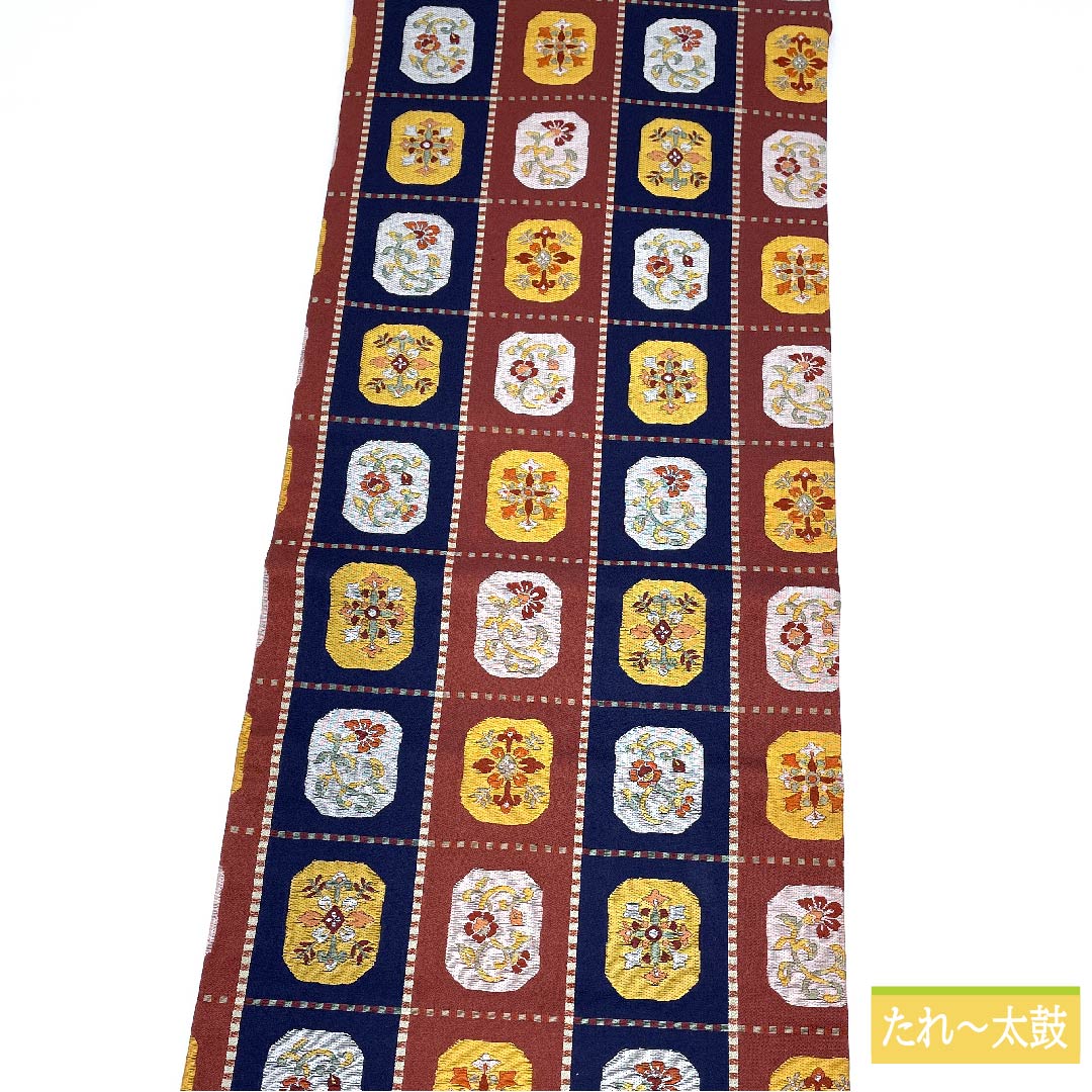 名古屋帯 正絹 蘇芳色(すおういろ) 市松 抽象花模様 帯丈358cm Sランク 六通 カジュアル 茶系 1124006412314 名古屋仕立て