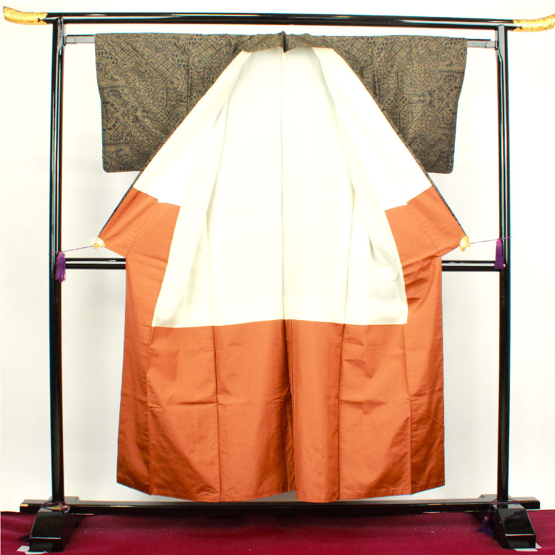 大島紬 身丈154.5cm 裄丈62cm 唐金色 経緯絣 抽象模様 正絹 Aランク 袷 黒系 1116002573210