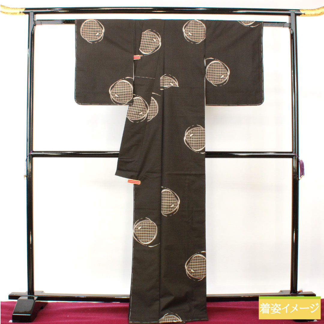 紬 正絹 身丈168.5cm 裄丈64.5cm 大島紬 9マルキ 経緯絣 抽象模様 Sランク 袷 茶系 1116003482514