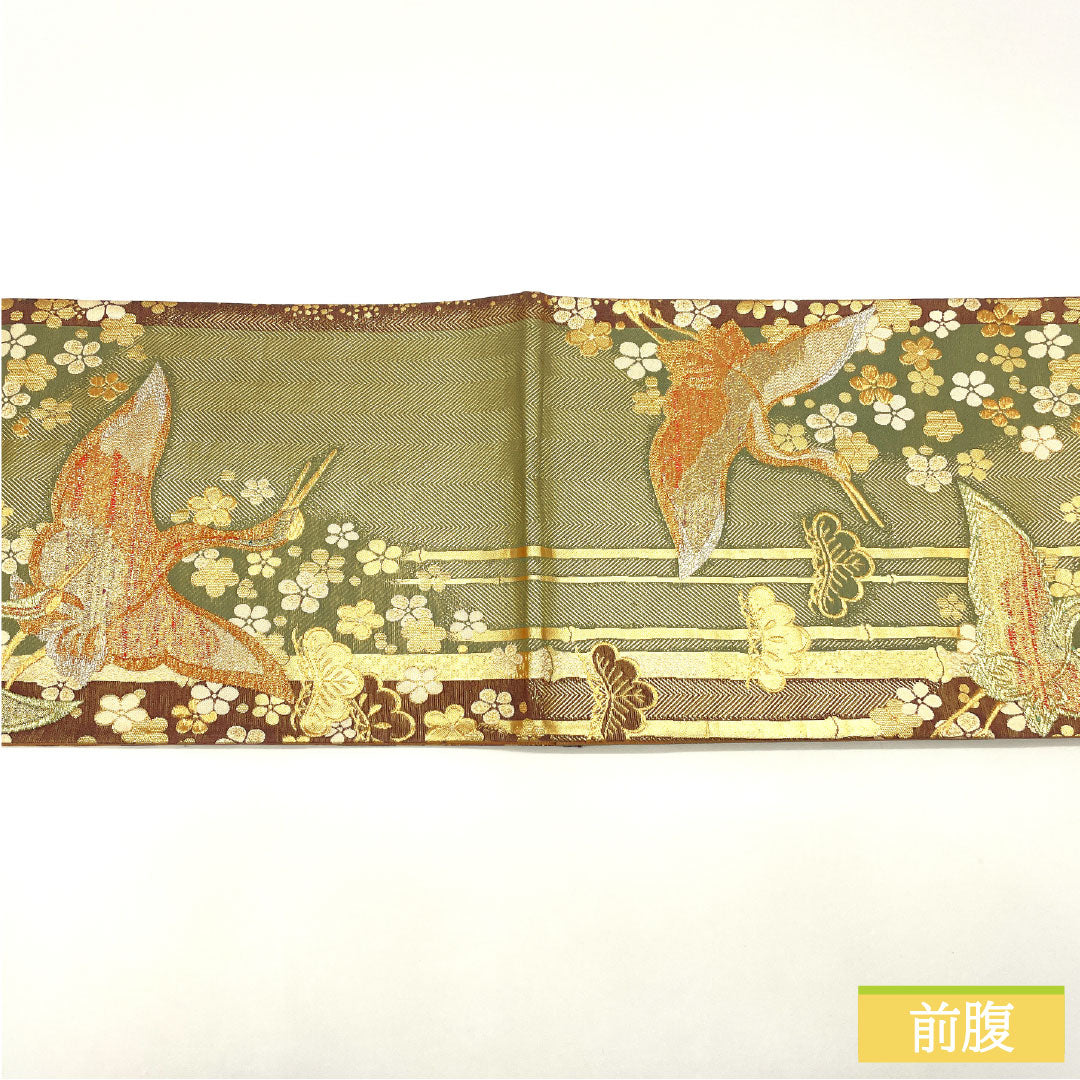 Formal, green-toned, pure silk obi with a crane design, bamboo, and plum motifs, suitable for furisode (long-sleeved kimono). Length: 436cm. Product code: 1123016502319.