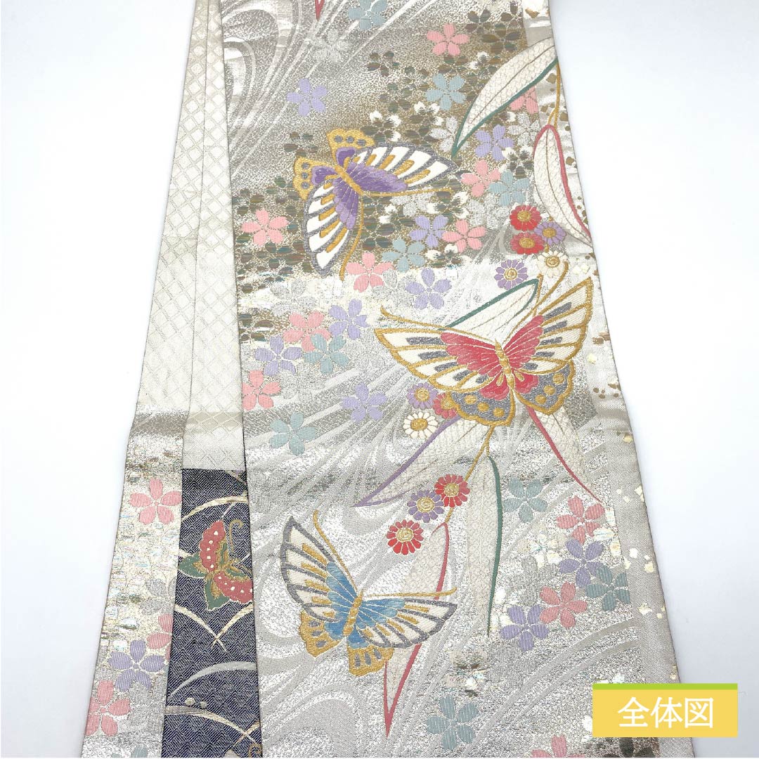 Formal, silver-colored, pure silk obi with a butterfly and cherry blossom pattern, perfect for furisode (long-sleeved kimono). Length: 436cm. Includes six obi stripes. Product code: 1123015552322.