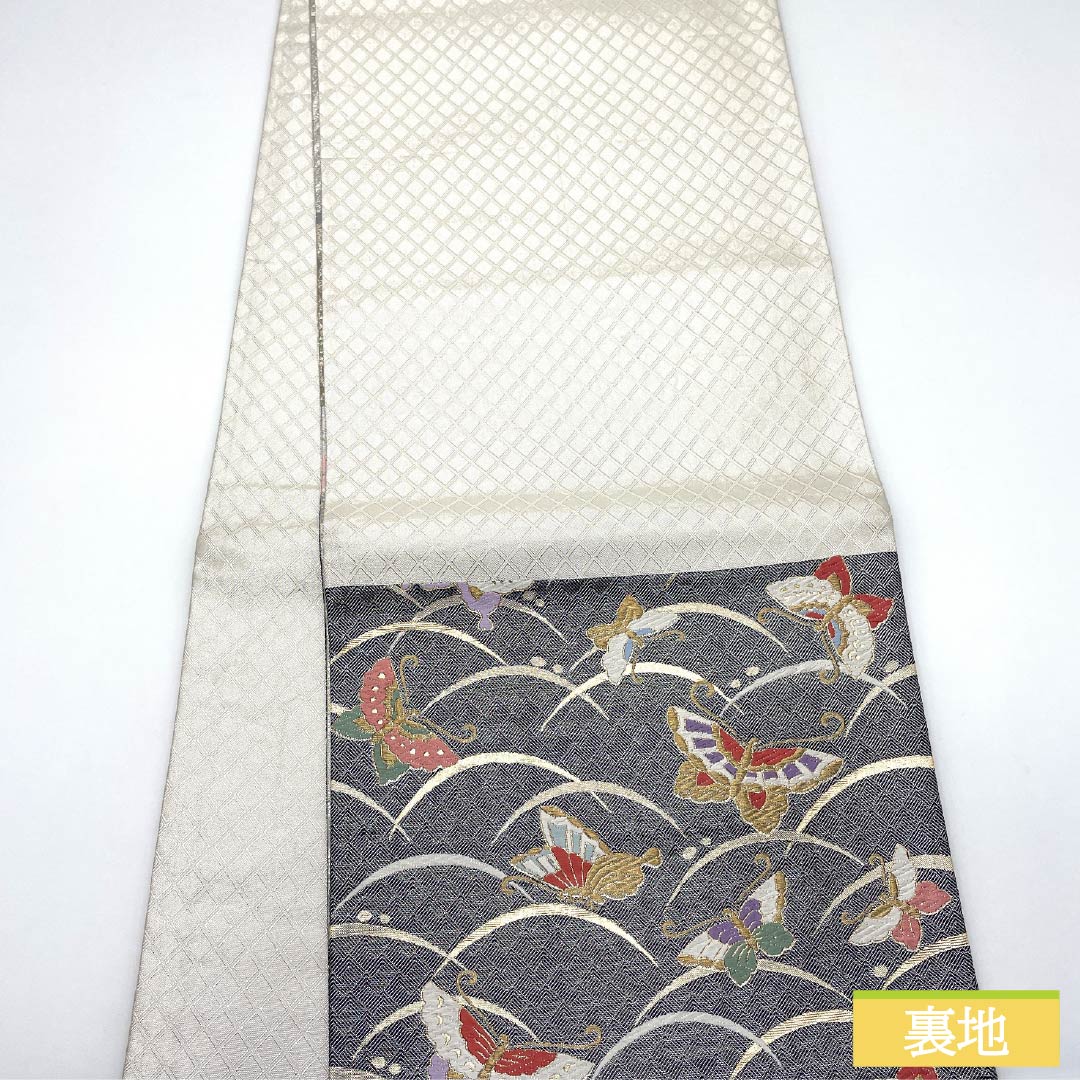 Formal, silver-colored, pure silk obi with a butterfly and cherry blossom pattern, perfect for furisode (long-sleeved kimono). Length: 436cm. Includes six obi stripes. Product code: 1123015552322.