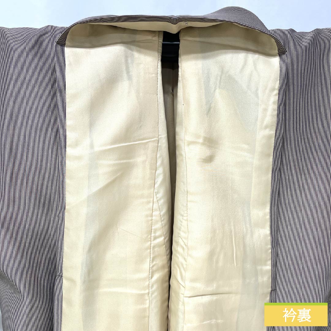 小紋 ポリエステル 身丈169cm 裄丈69.5cm 袷 落栗色(おちぐりいろ) 縦縞 未使用品 しつけ糸付き 洗える着物 Sランク 茶系 1115006002514