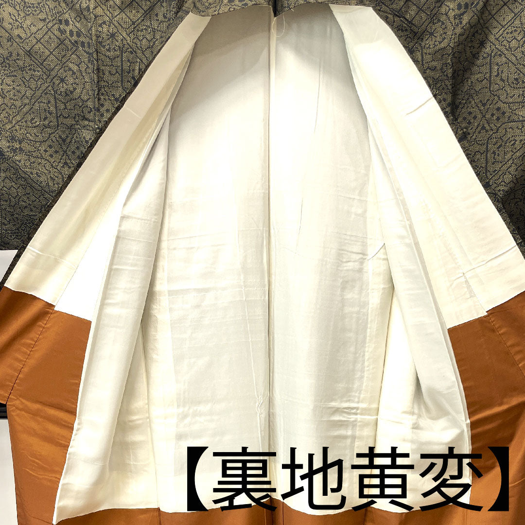 大島紬 身丈154.5cm 裄丈62cm 唐金色 経緯絣 抽象模様 正絹 Aランク 袷 黒系 1116002573210