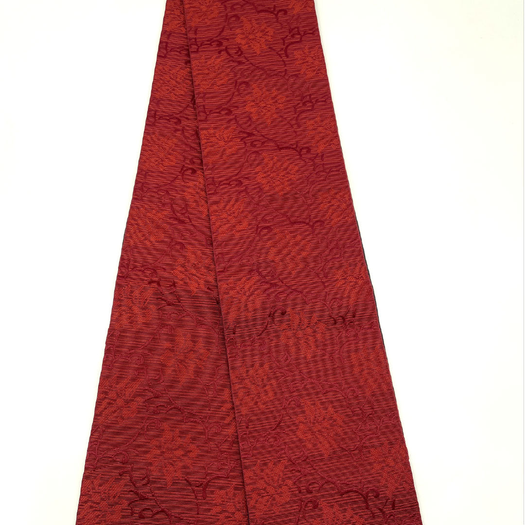 （新品）半幅帯 ポリエステル NEWランク 紅海老茶色（べにえびちゃいろ） 黒色 蔓 抽象花模様 横段 リバーシブル 帯丈400cm 赤系 1125002471412