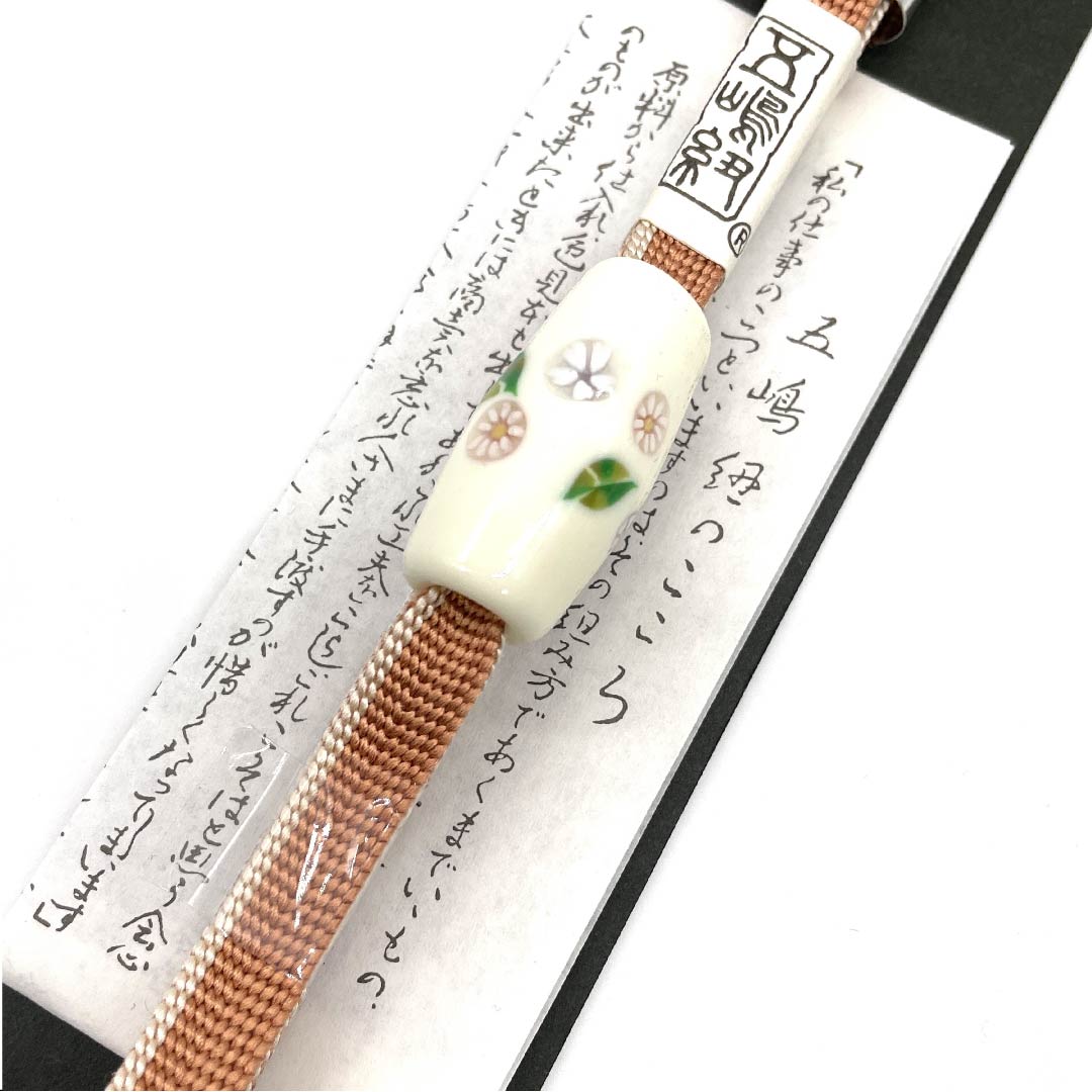 （新古品） 帯締め 正絹 三分紐 駱駝色（らくだいろ） 五嶋紐 鎌倉玻璃工房 帯留め付き 長さ約130cm 幅約1cm カジュアル Sランク 橙系 1135000132326