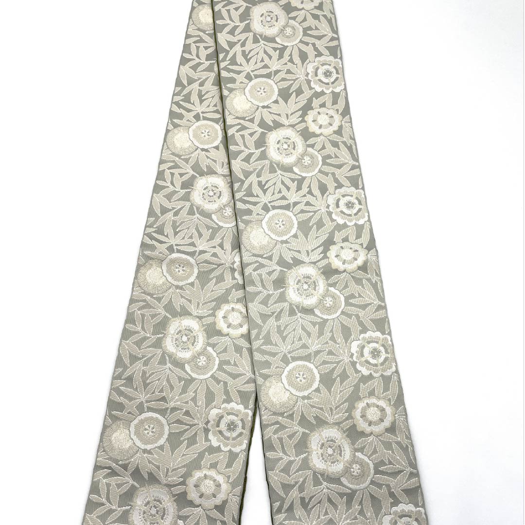（新品）半幅帯 ポリエステル NEWランク 白練色（しろねりいろ） 梅幸茶色（ばいこうちゃいろ） 抽象花模様 横段 リバーシブル 帯丈400cm グレー系 1125002721422