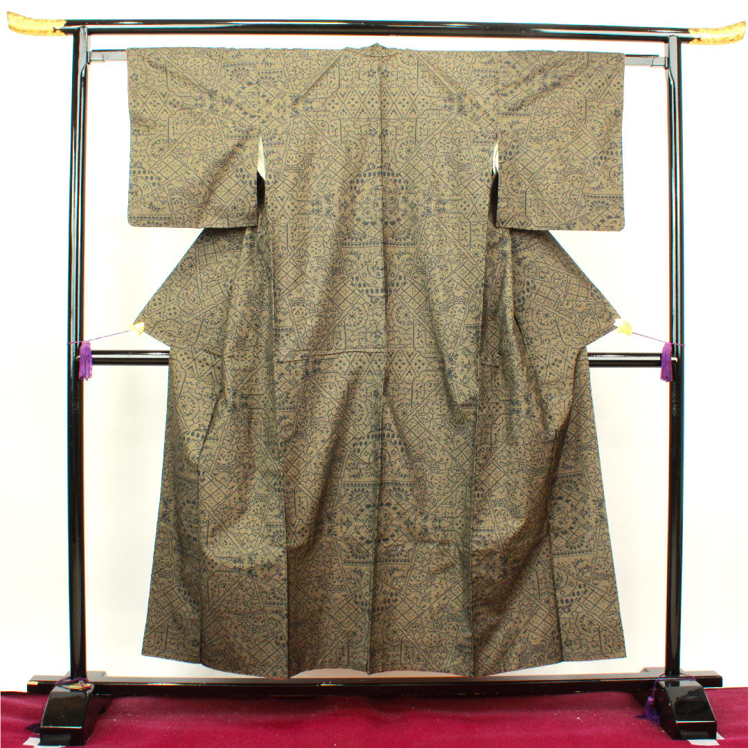 大島紬 身丈154.5cm 裄丈62cm 唐金色 経緯絣 抽象模様 正絹 Aランク 袷 黒系 1116002573210