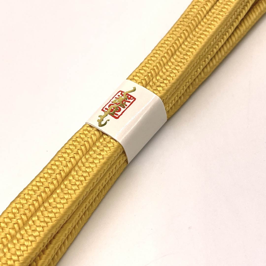 （新古品） 帯締め 正絹  黄唐紙色（きからかみいろ） 冠組 新古品 長さ約165.5cm 幅約1cm セミフォーマル NEWランク 黄系 1135003751323