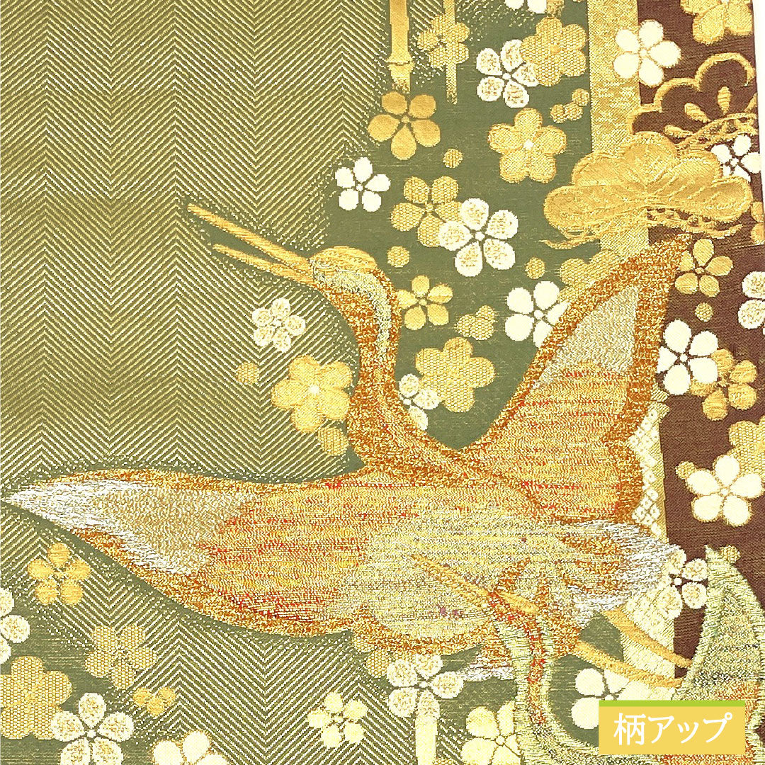 Formal, green-toned, pure silk obi with a crane design, bamboo, and plum motifs, suitable for furisode (long-sleeved kimono). Length: 436cm. Product code: 1123016502319.