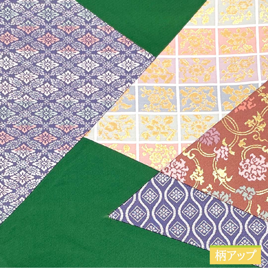 Dark green silk obi with a kiribame (traditional Chinese flower) design, tachiwaku (standing wave) pattern, and diamond pattern. Length: 444cm. S-rank. Semi-formal. Green. Product code: 1123014952319.