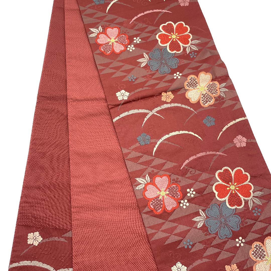 名古屋帯 京袋帯 深緋色 芝草 桜 鱗 唐草 帯丈381cm ポリ Sランク 六通 セミフォーマル 朱系 1124003322316  開き仕立て