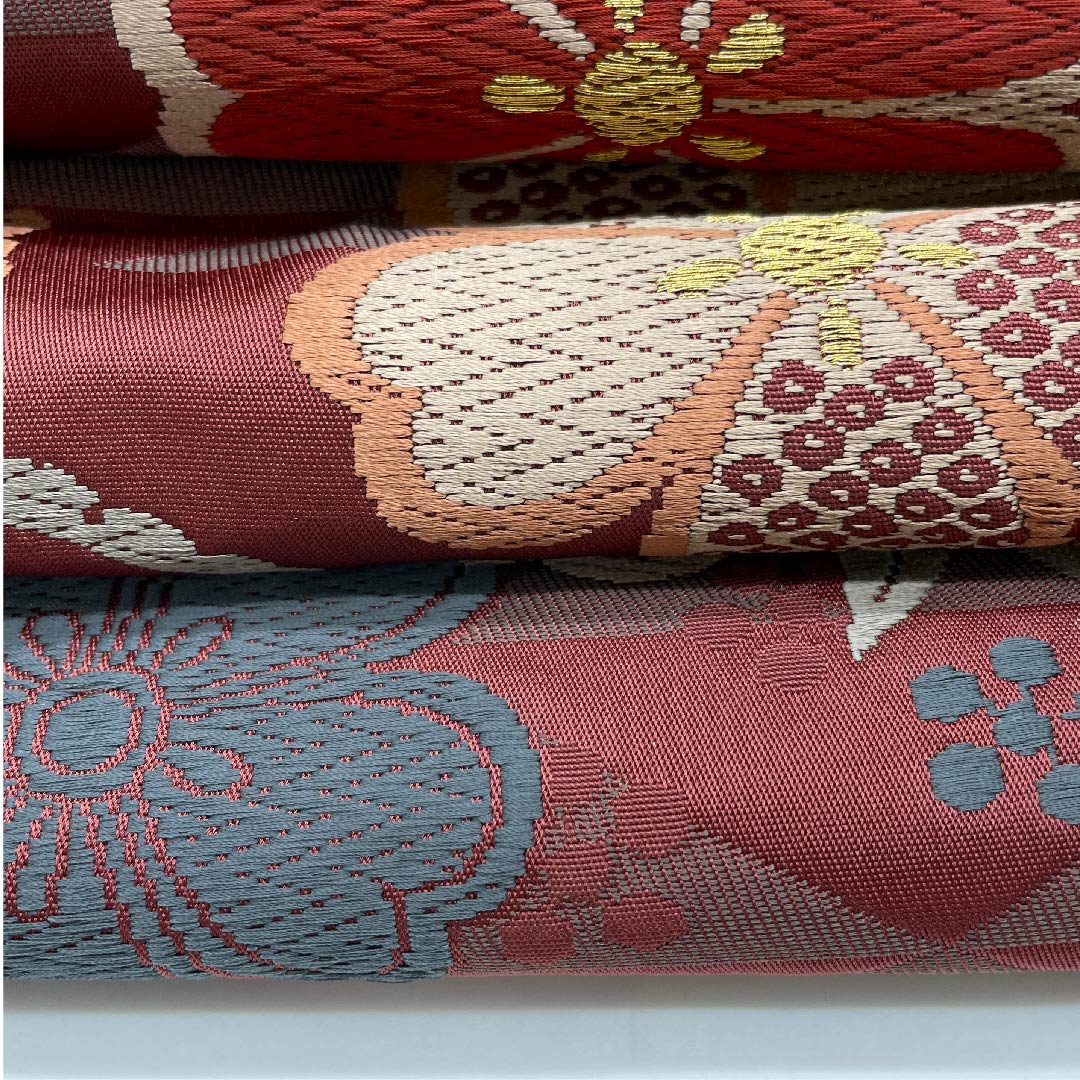 名古屋帯 京袋帯 深緋色 芝草 桜 鱗 唐草 帯丈381cm ポリ Sランク 六通 セミフォーマル 朱系 1124003322316  開き仕立て