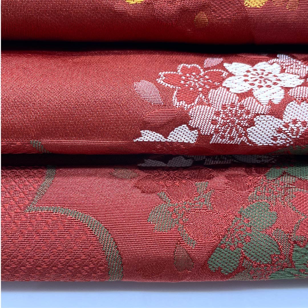 名古屋帯 京袋帯 生臙脂色 梅 桜 変わり市松 帯丈386.5cm ポリ Sランク 全通 セミフォーマル 朱系 1124003282316  開き仕立て