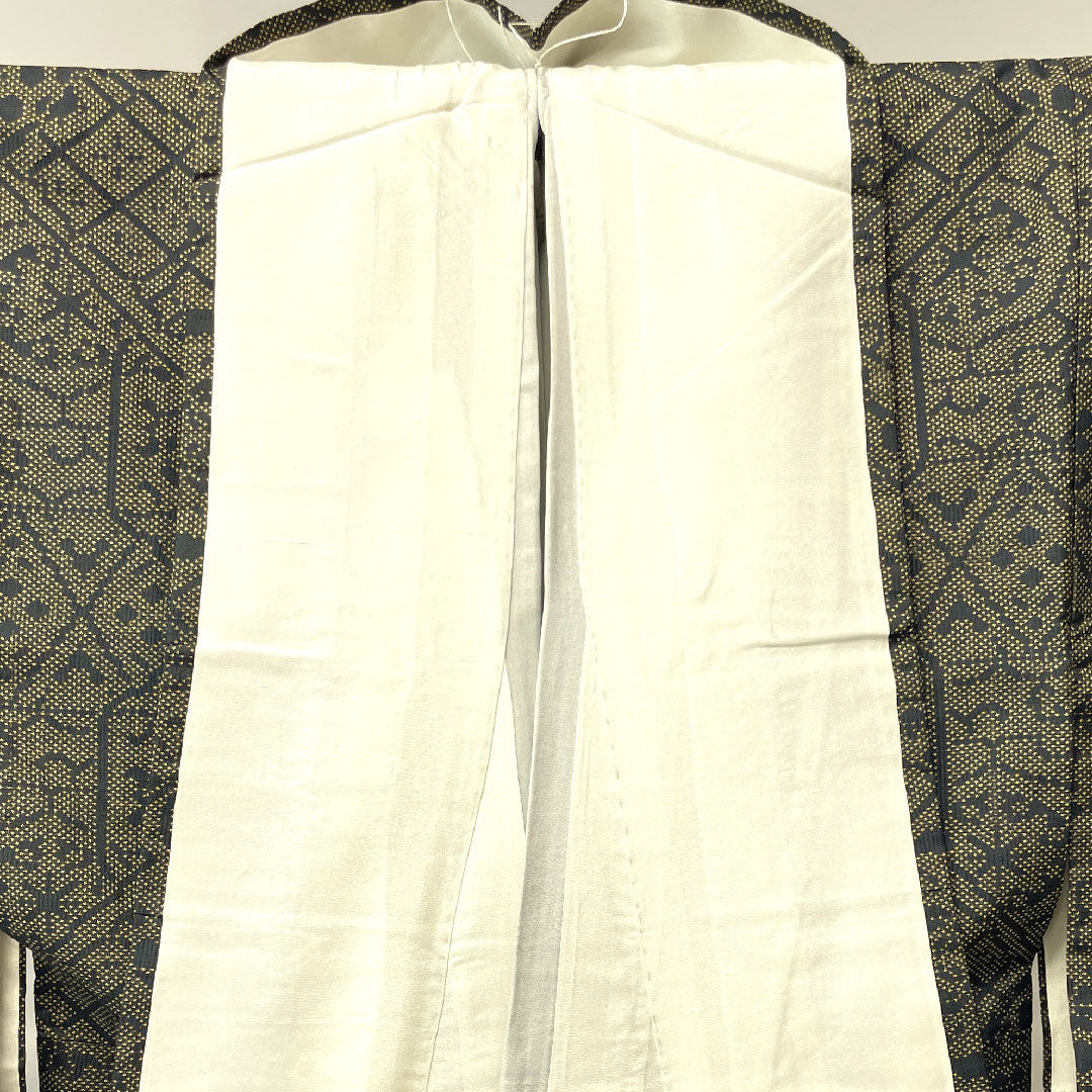 大島紬 身丈154.5cm 裄丈62cm 唐金色 経緯絣 抽象模様 正絹 Aランク 袷 黒系 1116002573210