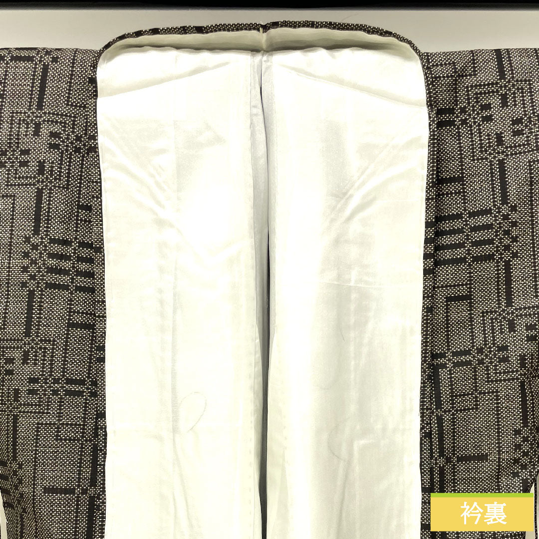 紬 正絹 身丈154.5cm 裄丈63cm 大島紬 経緯絣 幾何学模様 Aランク 袷 黒系 1116003563210