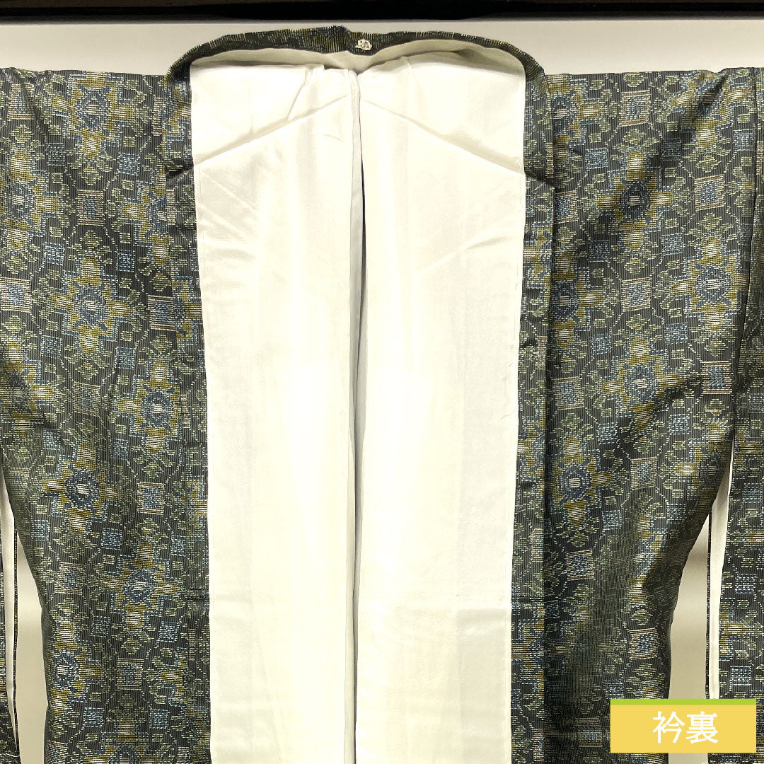 村山大島 正絹 身丈164.5cm 裄丈67cm  幾何学模様 しつけ糸付き 未使用品 Sランク 袷 緑系 1116003202419